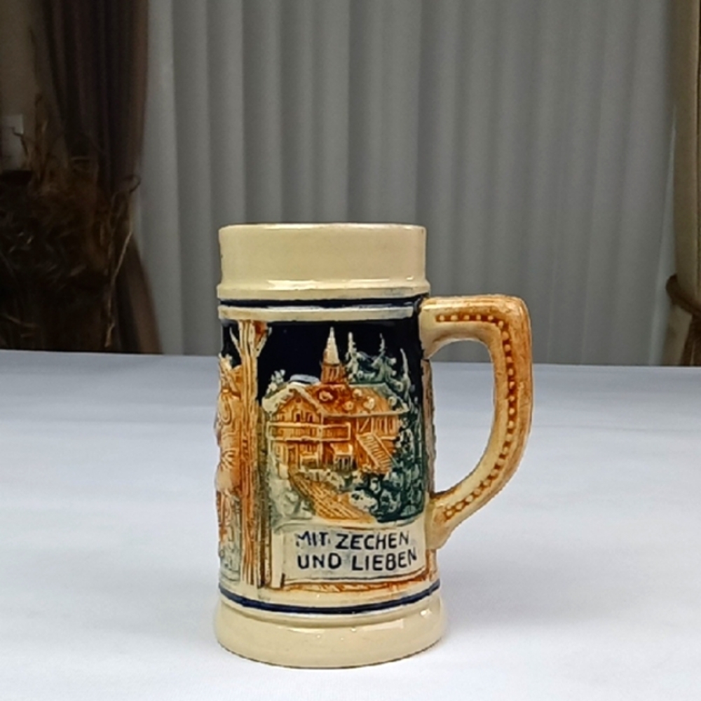 Western Germany Ceramic Beer Stein with Scenic Design.
